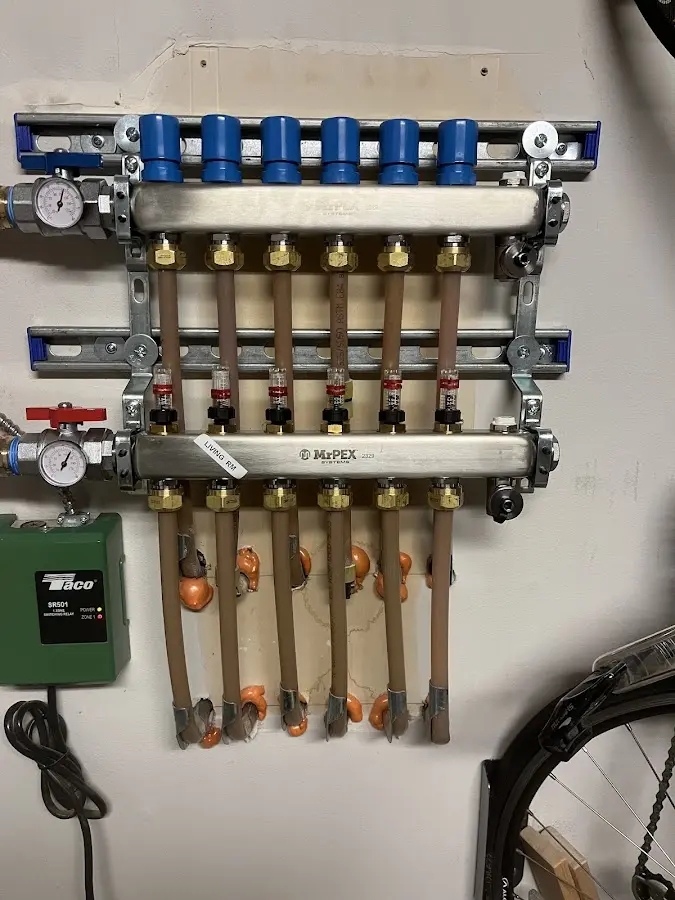 Plumber performing Water Heater Repair at a residential property in Clanton